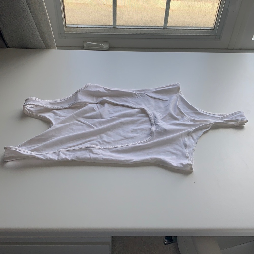 White backless body suit